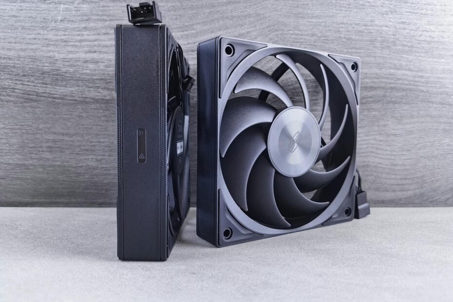 Side-by-side view of two high-performance computer cooling fans on a neutral background.